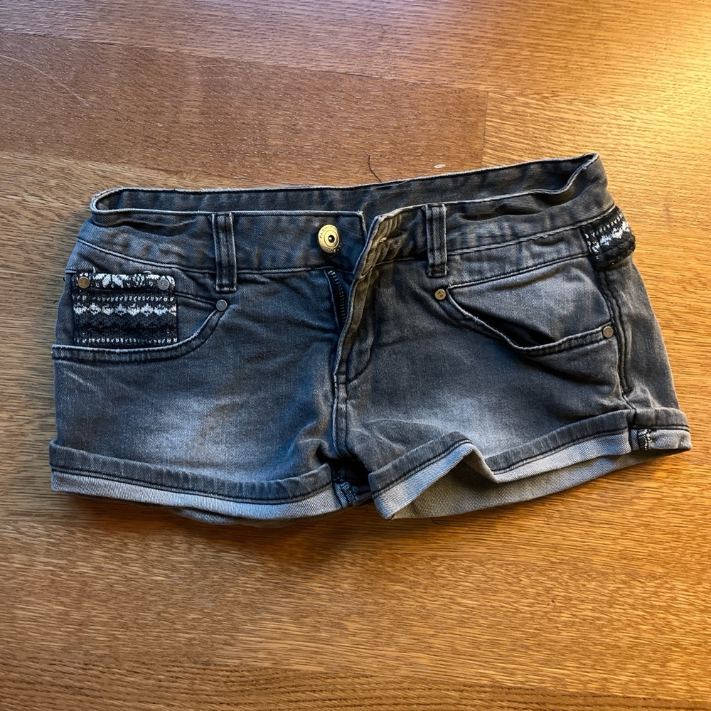 Faded Blue Jean Shorts with Cuffed Hem and Distressed Design